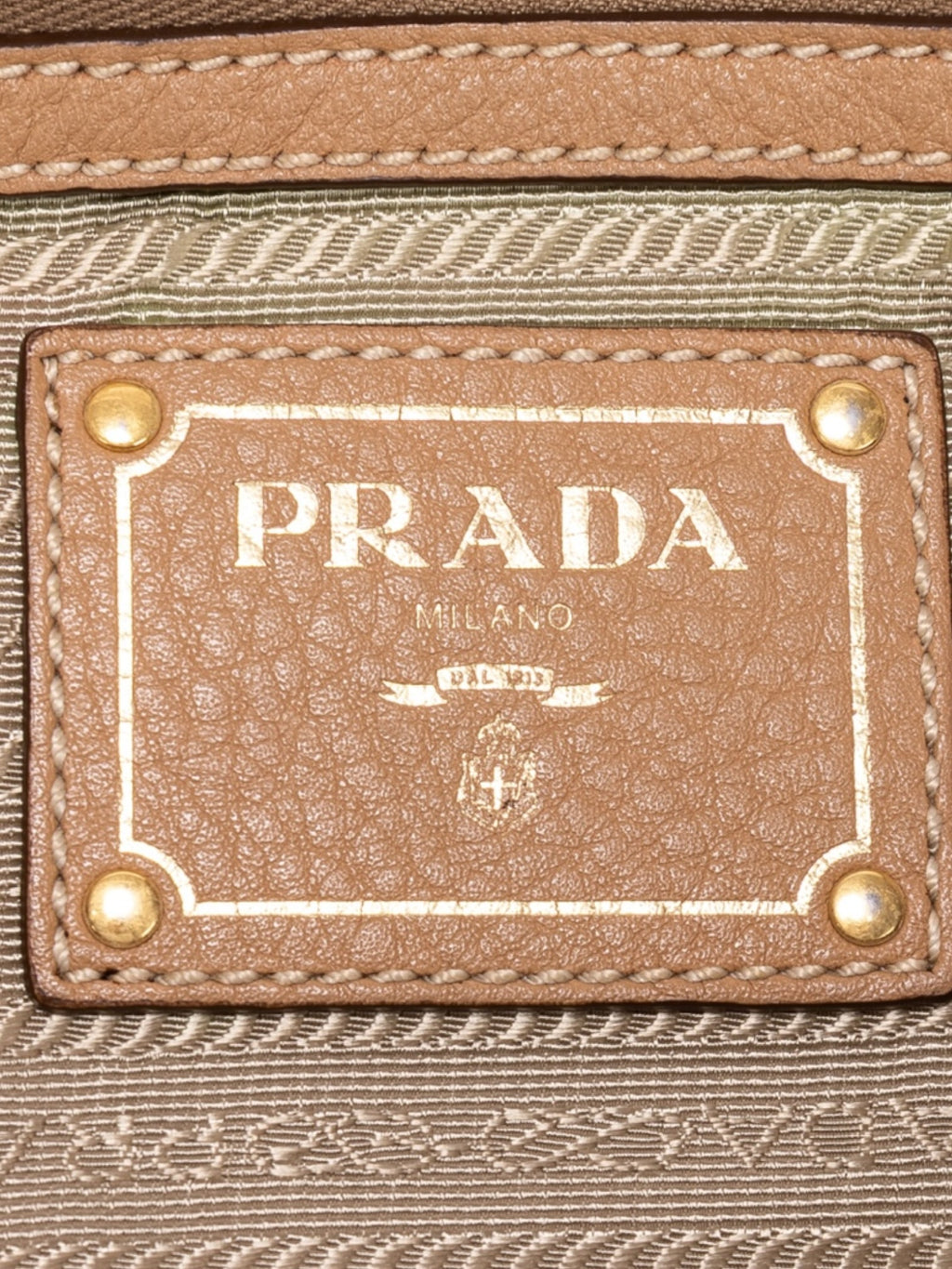 Prada Vitello Daino Shoulder Bag In Beige